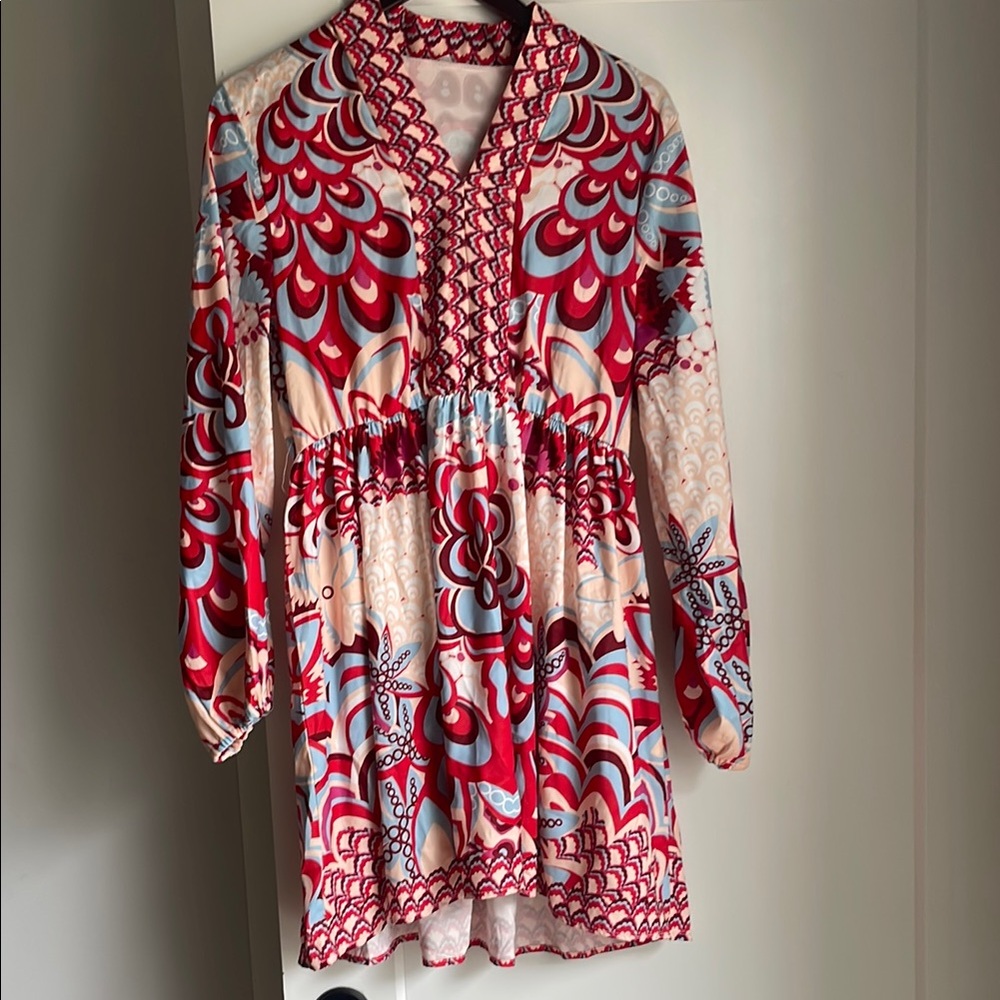 Vibrant Patterned Dress with Red and Blue Accents